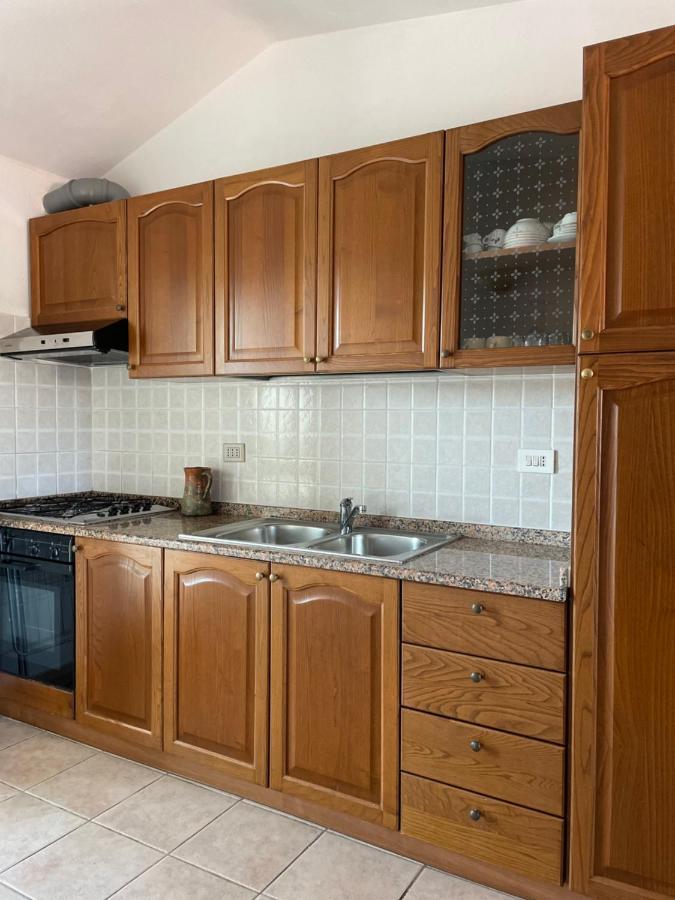 La Casa Di Tonia Apartment La Caletta Luaran gambar